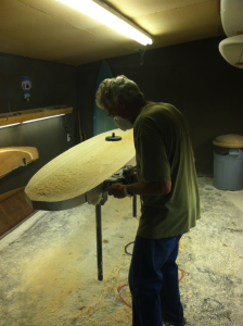Rough shaping balsawood surfboard